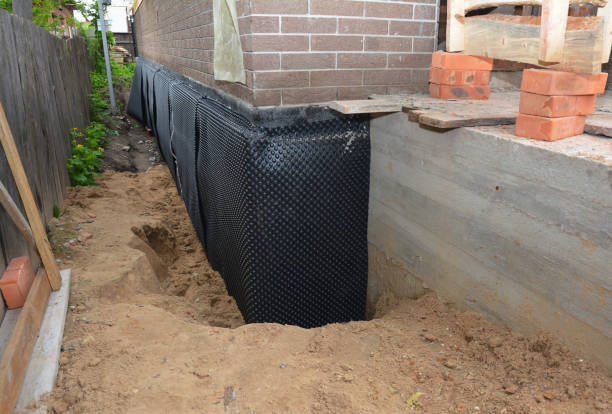 SJ Waterproofing Pros technician performing targeted Sump Pump Installation assessment in Whitwell, TN